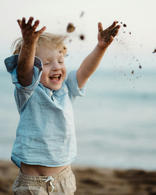 Child playing in sand