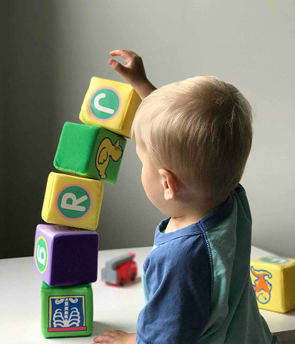 Child Stacking Blocks